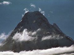 24 Gasherbrum IV and Gasherbrum II Close Up From Goro II Early Morning The sun shines over the top of Gasherbrum IV (7925m) with Gasherbrum II peaking out to its right, seen in the early morning from Goro II.